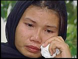 a photograph of Eugene Johnson's Thai wife.